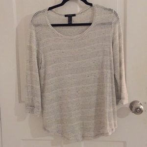 Grey knit long sleeve shirt.
